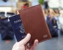 thumb of passport wallet